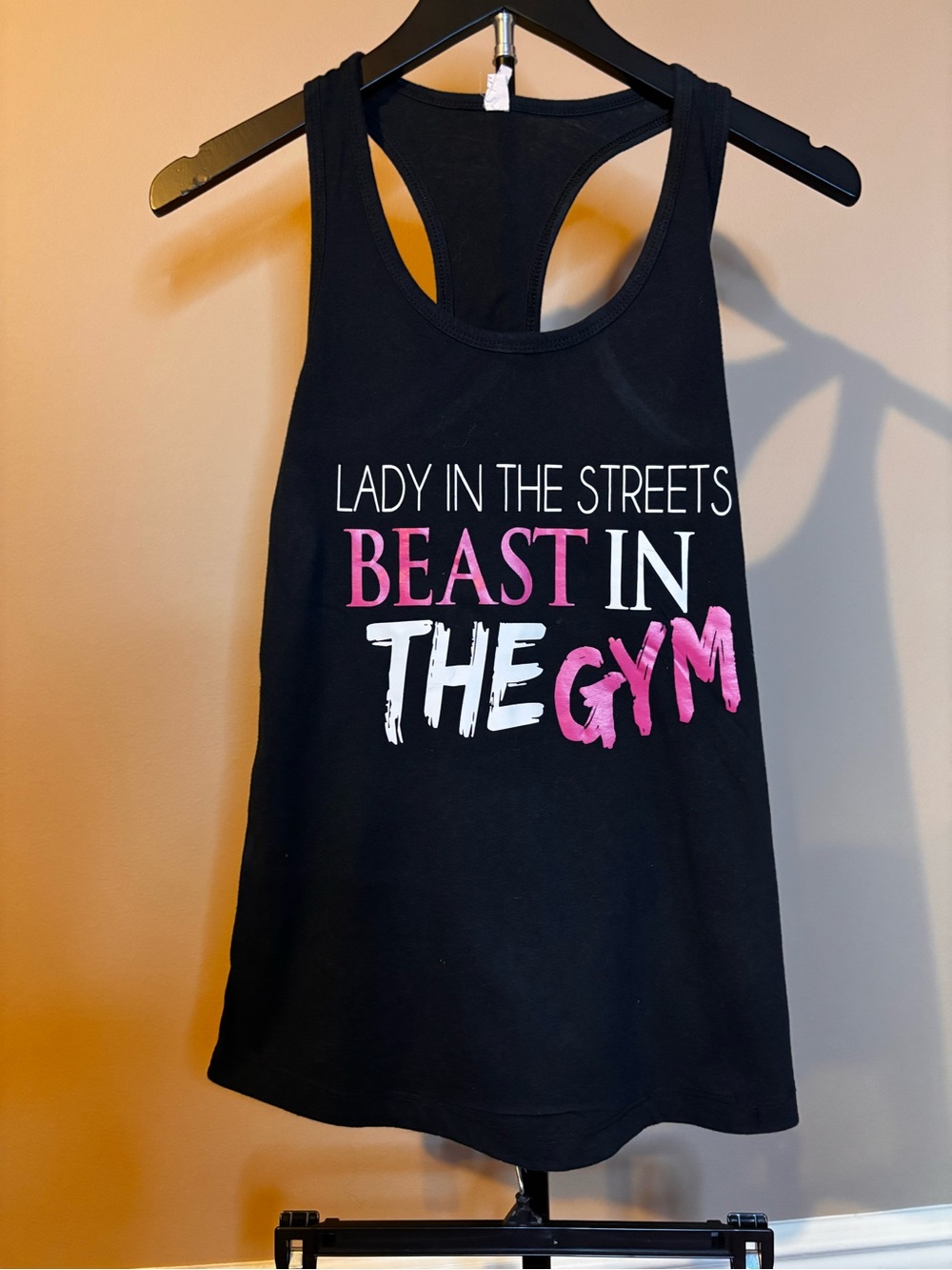Source Unknown Black Racerback Tank with Pink and White Slogan